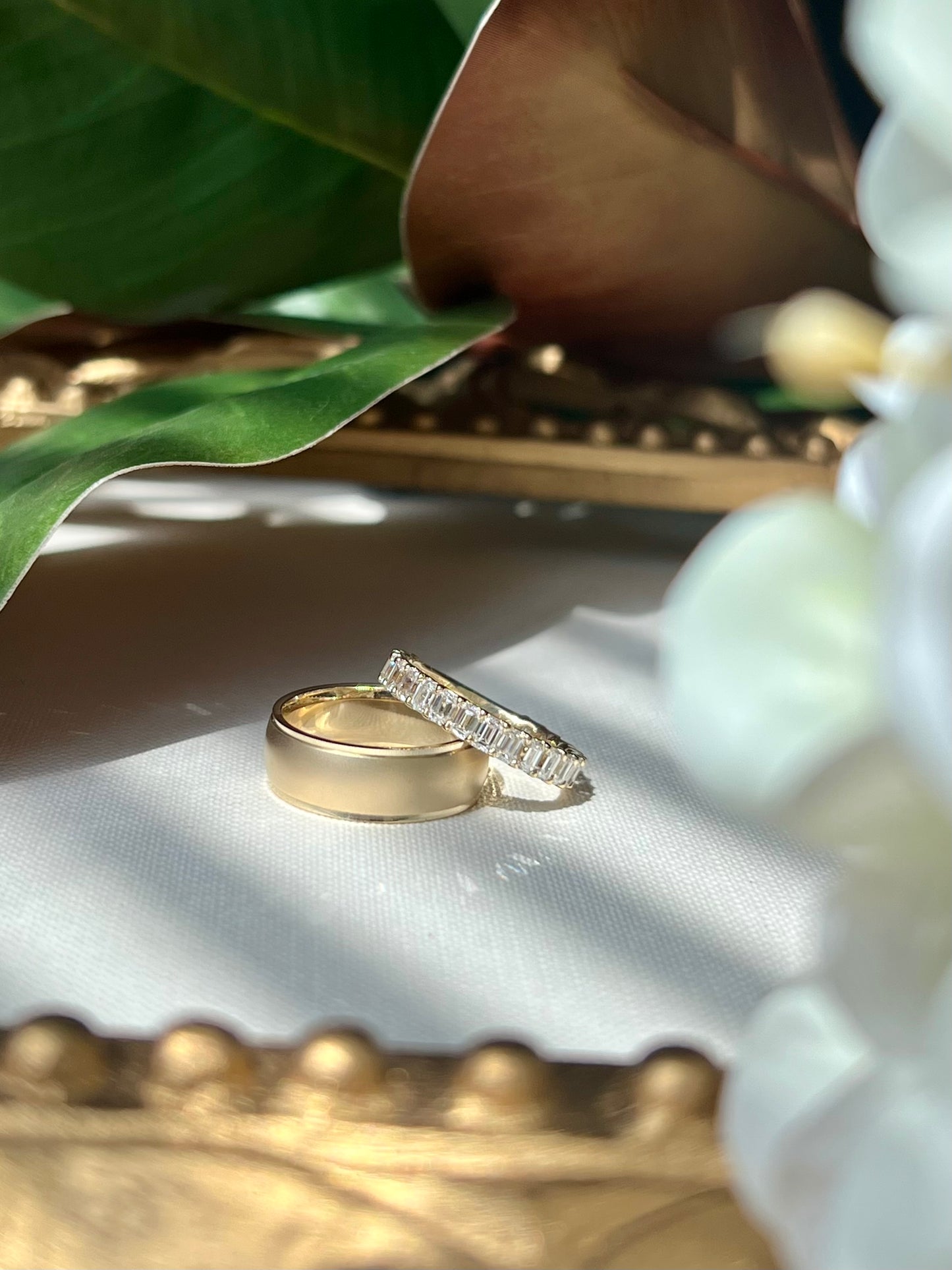 Custom 18kt yg lab grown emerald cut wedding band 3/4 eternity